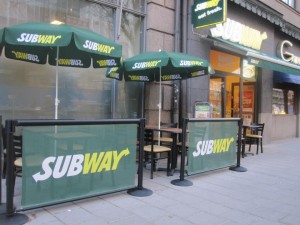 Q-Banner Outdoor Mesh Display At A Subway Restaurant