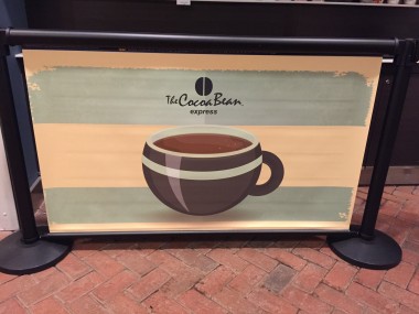 Coffee Cup Q-Banner Belt Stanchion Billboard Design Used at the Cocoa Bean Cafe